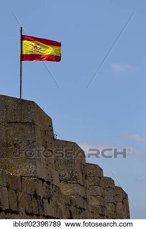 "Spanish flag, fortress of La Mola, near Mao, Mahon, Menorca Island, Balearic Islands, Spain, Southern Europe, Europe" View Large Photo Image Stock Photo - "Spanish flag, fortress of La Mola, near Mao, Mahon, Menorca Island, Balearic Islands, Spain, Southern Europe, Europe". Fotosearch