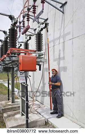 "Special engineer during outdoor work at a substation of transmission network operator 50Hertz, Bad Lauchstadt, Saxony-Anhalt, Germany, Europe" View Large Photo Image Stock Image - "Special engineer during outdoor work at a substation of transmission network operator 50Hertz, Bad Lauchstadt, Saxony-Anhalt, Germany, Europe". Fotosearch