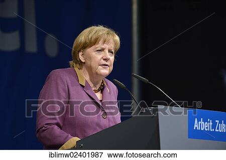 Stock Photo - "Speech by Federal Chancellor Dr. Angela Merkel, CDU, Stuttgart, Baden-Wuerttemberg, Germany, Europe, PublicGround, Europe". Fotosearch