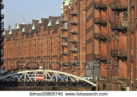 "Speicherstadt historic warehouse district with Poggenmuehlenbruecke bridge, Hamburg, Germany, Europe" View Large Photo Image Stock Photography - "Speicherstadt historic warehouse district with Poggenmuehlenbruecke bridge, Hamburg, Germany, Europe". Fotosearch
