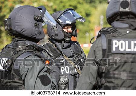 "Spezialeinsatzkommandos, SEK, the special response unit of the German state police forces, during an exercise of the NRW Police special task forces, North Rhine-Westphalia, Germany, Europe" View Large Photo Image Picture - "Spezialeinsatzkommandos, SEK, the special response unit of the German state police forces, during an exercise of the NRW Police special task forces, North Rhine-Westphalia, Germany, Europe". Fotosearch