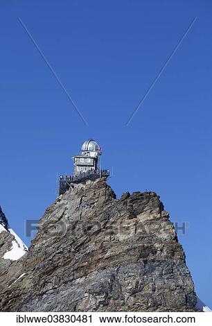 Stock Image - "Sphinx Observatory on Jungfraujoch, in front of Jungfrau Mountain, Grindelwald, Bernese Oberland, Canton of Bern, Switzerland, Europe". Fotosearch