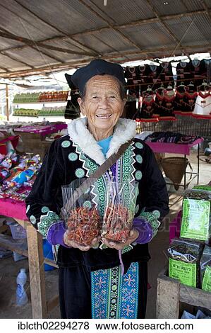 "Spice seller with dried chillies, Northern Thailand, Asia" View Large Photo Image Stock Photo - "Spice seller with dried chillies, Northern Thailand, Asia". Fotosearch