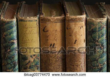 Stock Image - "Spines of antiquarian books, written by Marcus Tullius Cicero". Fotosearch