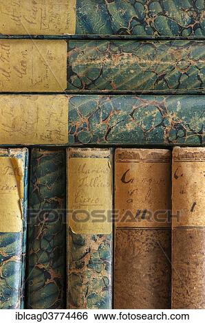 Stock Photograph - "Spines of antiquarian books, written by Marcus Tullius Cicero". Fotosearch