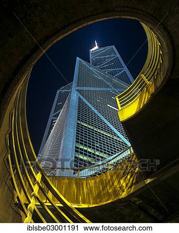 Stock Image - "Spiral staircase in front of the tower of the Bank of China, Victoria Island, Central District, Hong Kong, Hong Kong Island, Hong kong, China, People's Republic of China, Asia". Fotosearch