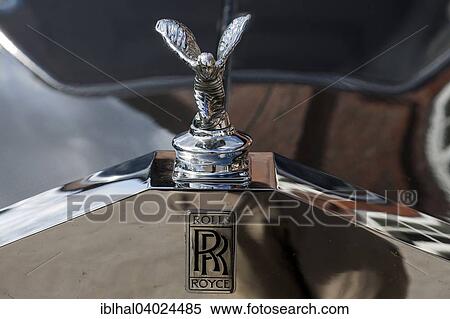 "Spirit of Ecstasy, kneeling, hood ornament, Rolls Royce" View Large Photo Image Stock Photography - "Spirit of Ecstasy, kneeling, hood ornament, Rolls Royce". Fotosearch