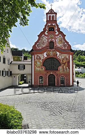 Stock Photo - "Spitalkirche, Hospital Church of the Holy Spirit with frescoes on the facade, Fuessen, Ostallgaeu, Allgaeu, Schwabia, Bavaria, Germany, Europe". Fotosearch