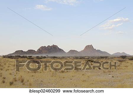 Stock Photo - "Spitzkoppe, morning mist, Namib Desert, Namibia, Africa". Fotosearch