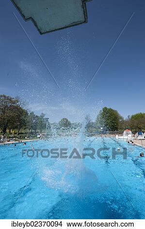 "Splash after diving into a public swimming pool, Moehringer Freibad, Stuttgart, Baden-Wuerttemberg, Germany, Europe" View Large Photo Image Picture - "Splash after diving into a public swimming pool, Moehringer Freibad, Stuttgart, Baden-Wuerttemberg, Germany, Europe". Fotosearch