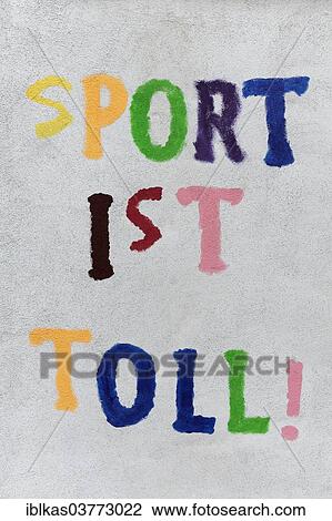 "Sport ist toll"""" or """"Sports is great, """" mural in a school playground, Germany, Europe" View Large Photo Image Stock Image - "Sport ist toll"""" or """"Sports is great, """" mural in a school playground, Germany, Europe". Fotosearch