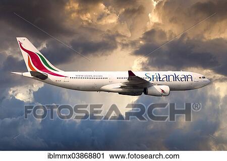 Stock Image - SriLankan Airlines Airbus A330-243 in flight. Fotosearch