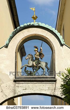 Stock Image - "St. George slaying the Murnau dragon, Maria-Hilf-Kirche church, Untermarkt, Murnau am Staffelsee, Upper Bavaria, Bavaria, Germany, Europe". Fotosearch