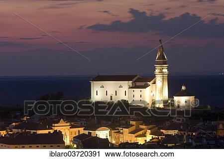 Stock Image - "St. George's Cathedral in the evening, Piran, Coastalâ€“Karst Statistical Region, Slovenia, Europe". Fotosearch