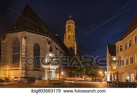 "St. George's Church with its steeple called """"Daniel"""" and the market fountain at night, historic center, Nordlingen, Bavaria, Germany, Europe" View Large Photo Image Stock Photo - "St. George's Church with its steeple called """"Daniel"""" and the market fountain at night, historic center, Nordlingen, Bavaria, Germany, Europe". Fotosearch
