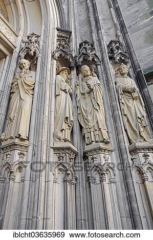 "St. Lambert's Church or Lambertikirche church, statues at the entrance, Munster, Munsterland, Nordrhein-Westfalen, Germany, Europe" View Large Photo Image Stock Photo - "St. Lambert's Church or Lambertikirche church, statues at the entrance, Munster, Munsterland, Nordrhein-Westfalen, Germany, Europe". Fotosearch