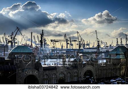"St. Pauli Landing Bridges in front of the Blohm + Voss shipyard with cranes, Hamburg-Mitte, Hamburg, Hamburg, Germany, Europe" View Large Photo Image Stock Image - "St. Pauli Landing Bridges in front of the Blohm + Voss shipyard with cranes, Hamburg-Mitte, Hamburg, Hamburg, Germany, Europe". Fotosearch