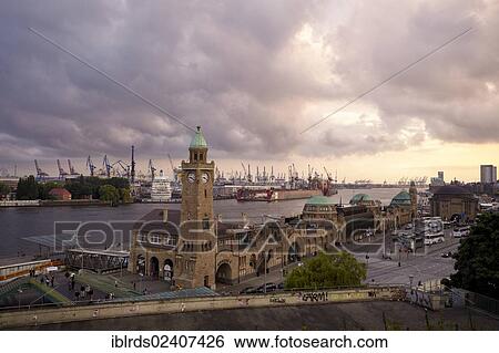 "St. Pauli Landungsbrucken jetties with level tower and Blohm + Voss shipyard in Hamburg, Germany, Europe" View Large Photo Image Stock Photograph - "St. Pauli Landungsbrucken jetties with level tower and Blohm + Voss shipyard in Hamburg, Germany, Europe". Fotosearch