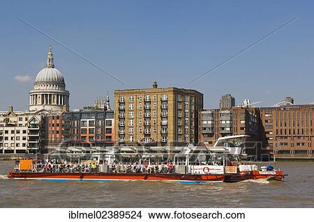 "St Paul's Cathedral near the Millennium Footbridge, pedestrian bridge over Thames with Thames Clippers boat, City of London, from Bankside, London, United Kingdom, Europe" View Large Photo Image Picture - "St Paul's Cathedral near the Millennium Footbridge, pedestrian bridge over Thames with Thames Clippers boat, City of London, from Bankside, London, United Kingdom, Europe". Fotosearch