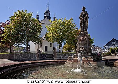 "St. Peter's Fountain with St. Heribert's Church, Hallenberg, Hochsauerlandkreis district, North Rhine-Westphalia, Germany, Europe, PublicGround, Europe" View Large Photo Image Stock Image - "St. Peter's Fountain with St. Heribert's Church, Hallenberg, Hochsauerlandkreis district, North Rhine-Westphalia, Germany, Europe, PublicGround, Europe". Fotosearch
