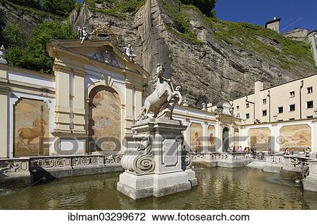 "Stables with a horse tamer statue by Bernhard Michael Mandl, Pferdeschwemme Baroque fountain, historic center, Salzburg, Salzburg State, Austria, Europe" View Large Photo Image Stock Image - "Stables with a horse tamer statue by Bernhard Michael Mandl, Pferdeschwemme Baroque fountain, historic center, Salzburg, Salzburg State, Austria, Europe". Fotosearch