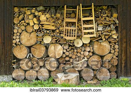 "Stack of firewood at a lodge, Steingaden, Upper Bavaria, Bavaria, Germany, Europe" View Large Photo Image Stock Photo - "Stack of firewood at a lodge, Steingaden, Upper Bavaria, Bavaria, Germany, Europe". Fotosearch