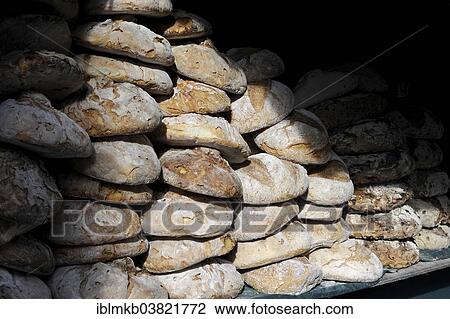 "Stack of freshly baked bread at the annual All Saints Market in Cocentaina, Alicante province, Spain, Europe" View Large Photo Image Stock Image - "Stack of freshly baked bread at the annual All Saints Market in Cocentaina, Alicante province, Spain, Europe". Fotosearch