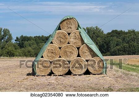 "Stack of straw bales, round bales, Dreieich-Goetzenhain, Hesse, Germany, Europe" View Large Photo Image Stock Image - "Stack of straw bales, round bales, Dreieich-Goetzenhain, Hesse, Germany, Europe". Fotosearch