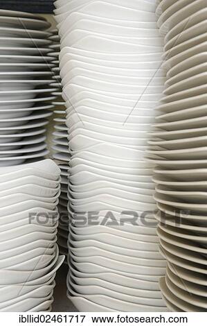 Stacked plates View Large Photo Image Stock Photo - Stacked plates. Fotosearch