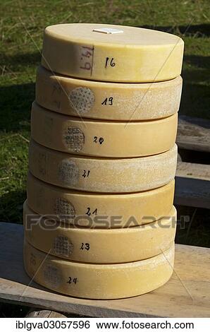 "Stacked wheels of round Swiss Alpine cheese for distribution to the Chaesteilet, Justistal, Beatenberg, Canton of Bern, Switzerland, Europe" View Large Photo Image Stock Photograph - "Stacked wheels of round Swiss Alpine cheese for distribution to the Chaesteilet, Justistal, Beatenberg, Canton of Bern, Switzerland, Europe". Fotosearch