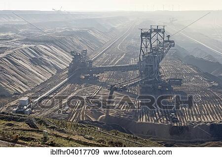 "Stacker in the Garzweiler open pit, Grevenbroich, North Rhine-Westphalia, Germany, Europe" View Large Photo Image Stock Photo - "Stacker in the Garzweiler open pit, Grevenbroich, North Rhine-Westphalia, Germany, Europe". Fotosearch