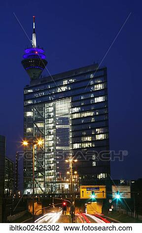 "Stadttor, City Gate skyscraper, at night, Duesseldorf, North Rhine-Westphalia, Germany, Europe" View Large Photo Image Stock Image - "Stadttor, City Gate skyscraper, at night, Duesseldorf, North Rhine-Westphalia, Germany, Europe". Fotosearch