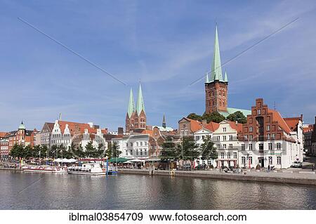 "Stadttrave river or Trave River with the historic centre of Lubeck, Schleswig-Holstein, Germany, Europe" View Large Photo Image Stock Photo - "Stadttrave river or Trave River with the historic centre of Lubeck, Schleswig-Holstein, Germany, Europe". Fotosearch
