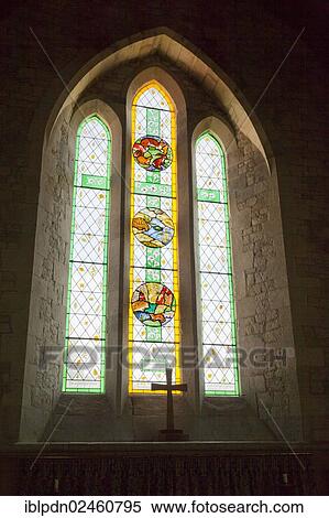 Stock Photography - "Stained glass window commemorating Gilbert White in Saint Mary's Church, Selborne, Hampshire, United Kingdom, Europe". Fotosearch