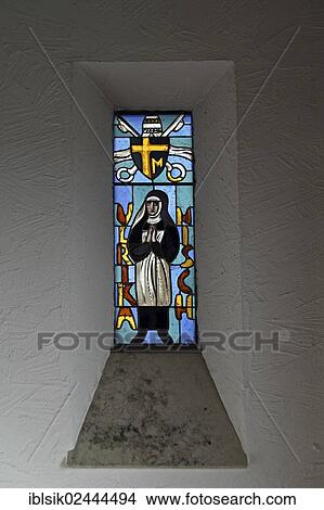 "Stained glass window displaying saint Ulrika Nisch, praying hands, Bussenkirche church, St. John the Baptist auf dem Bussen, Offingen, Uttenweiler, Upper Swabia, Baden-Wuerttemberg, Germany, Europe" View Large Photo Image Picture - "Stained glass window displaying saint Ulrika Nisch, praying hands, Bussenkirche church, St. John the Baptist auf dem Bussen, Offingen, Uttenweiler, Upper Swabia, Baden-Wuerttemberg, Germany, Europe". Fotosearch