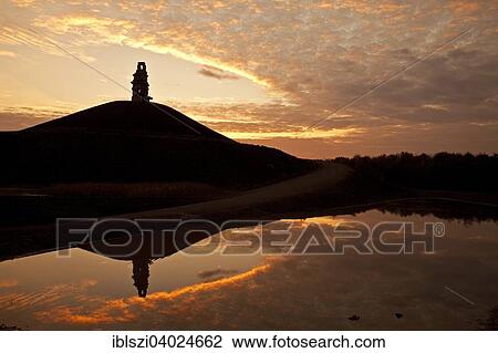"Stairway to Heaven work of art on the Rheinelbe heap reflected on a water surface, Gelsenkirchen, Ruhr district, North Rhine-Westphalia, Germany, Europe" View Large Photo Image Stock Image - "Stairway to Heaven work of art on the Rheinelbe heap reflected on a water surface, Gelsenkirchen, Ruhr district, North Rhine-Westphalia, Germany, Europe". Fotosearch