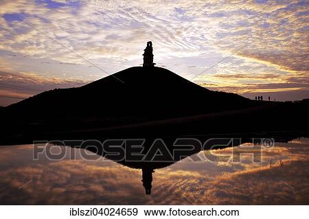 "Stairway to Heaven work of art on the Rheinelbe heap reflected on a water surface, Gelsenkirchen, Ruhr district, North Rhine-Westphalia, Germany, Europe" View Large Photo Image Stock Photo - "Stairway to Heaven work of art on the Rheinelbe heap reflected on a water surface, Gelsenkirchen, Ruhr district, North Rhine-Westphalia, Germany, Europe". Fotosearch