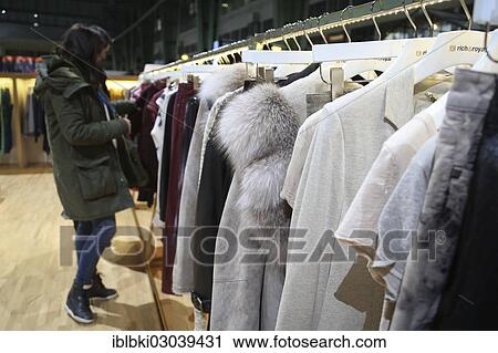 Stock Image - "Stall of Rich and Royal at the Bread and Butter Winter 2013 fashion fair in the grounds of the former Berlin-Tempelhof airport, Berlin, Germany, Europe". Fotosearch