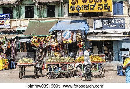 Stock Photography - "Stall with bananas and oranges, Indian market, Mysore, Karnataka, India, Asia". Fotosearch