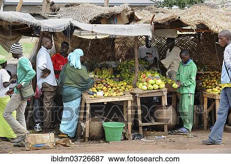 Stock Photo - "Stall with fruit and vegetables on a thoroughfare, Garoua, North Region, Cameroon, Africa". Fotosearch