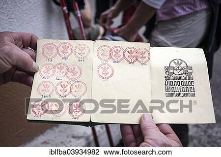 Stock Image - "Stamps in the Pilgrim Pass, the 30th pilgrimage of Hans Unterberger, Grossglockner pilgrimage from Fisch and Rauris, Salzburg State, to Heiligenblut to St. Peter and Paul, Carinthia, Austria, Europe". Fotosearch