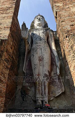 "Standing Buddha statue Phra Attharot, Wat Mahathat temple complex, Sukhothai Historical Park, Sukhothai, Northern Thailand, Thailand, Asia" View Large Photo Image Stock Image - "Standing Buddha statue Phra Attharot, Wat Mahathat temple complex, Sukhothai Historical Park, Sukhothai, Northern Thailand, Thailand, Asia". Fotosearch