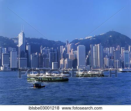 Stock Photo - "Star Ferries in front of the Central District skyline of Victoria Island, Central District, Hong Kong, Hong Kong Island, Hong kong, China, People's Republic of China, Asia". Fotosearch