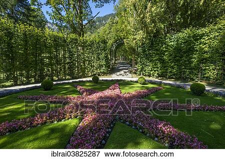 "Star-shaped flowerbed between the garden archway, Schlosspark palace gardens, Schloss Linderhof Palace, Upper Bavaria, Bavaria, Germany, Europe" View Large Photo Image Stock Photo - "Star-shaped flowerbed between the garden archway, Schlosspark palace gardens, Schloss Linderhof Palace, Upper Bavaria, Bavaria, Germany, Europe". Fotosearch