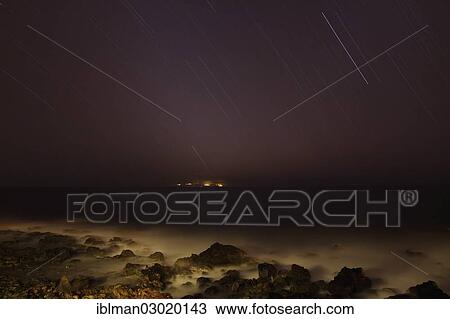"Star trails, exposed for 1 hour, coast with views towards the neighboring island of El Hierro, La Puntilla, Valle Gran Rey, La Gomera, Canary Islands, Spain, Europe" View Large Photo Image Stock Image - "Star trails, exposed for 1 hour, coast with views towards the neighboring island of El Hierro, La Puntilla, Valle Gran Rey, La Gomera, Canary Islands, Spain, Europe". Fotosearch