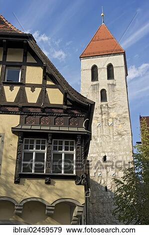 "Stately half-timbered house, now used as Teehaus Bachfischer tea house, tower of the Collegiate Church of Our Lady or Old Chapel, historic town centre of Regensburg, Upper Palatinate, Bavaria, Germany, Europe" View Large Photo Image Stock Photo - "Stately half-timbered house, now used as Teehaus Bachfischer tea house, tower of the Collegiate Church of Our Lady or Old Chapel, historic town centre of Regensburg, Upper Palatinate, Bavaria, Germany, Europe". Fotosearch