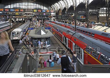 "Station concourse with travelers, and local and long-distance trains, Central Station, Hamburg, Germany, Europe" View Large Photo Image Stock Photo - "Station concourse with travelers, and local and long-distance trains, Central Station, Hamburg, Germany, Europe". Fotosearch