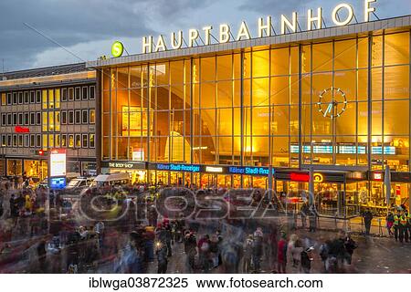 Stock Photography - "Station forecourt, crowd on Carnival Monday, central railway station, Cologne, Rhineland, North Rhine-Westphalia, Germany, Europe". Fotosearch