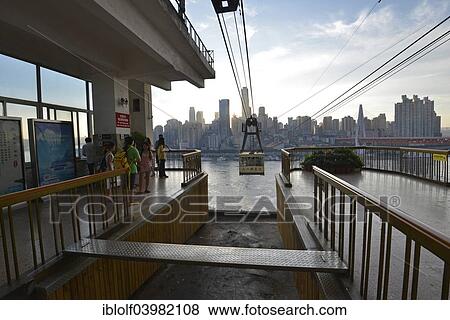 "Station of the cable car travelling over the Yangtze River, new high-rise buildings at the back, Chongqing, China, Asia" View Large Photo Image Stock Photo - "Station of the cable car travelling over the Yangtze River, new high-rise buildings at the back, Chongqing, China, Asia". Fotosearch