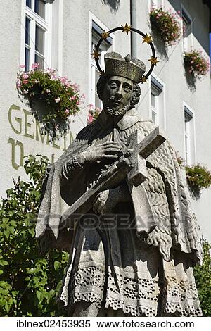 "Statue of a bridge saint in front parish town hall, Marktschellenberg, Berchtesgaden, Upper Bavaria, Bavaria, Germany, Europe" View Large Photo Image Stock Photography - "Statue of a bridge saint in front parish town hall, Marktschellenberg, Berchtesgaden, Upper Bavaria, Bavaria, Germany, Europe". Fotosearch
